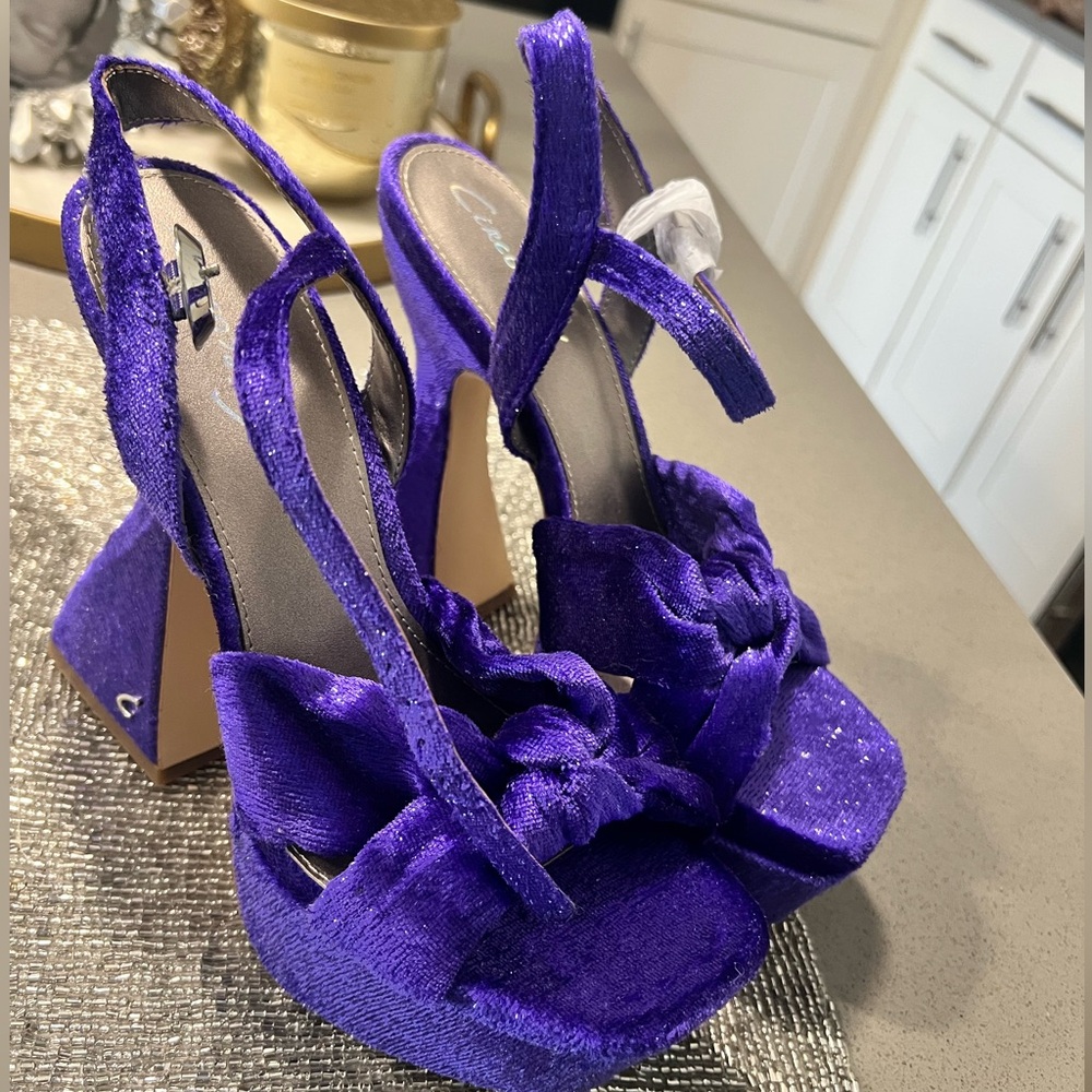 Purple platform heels never worn